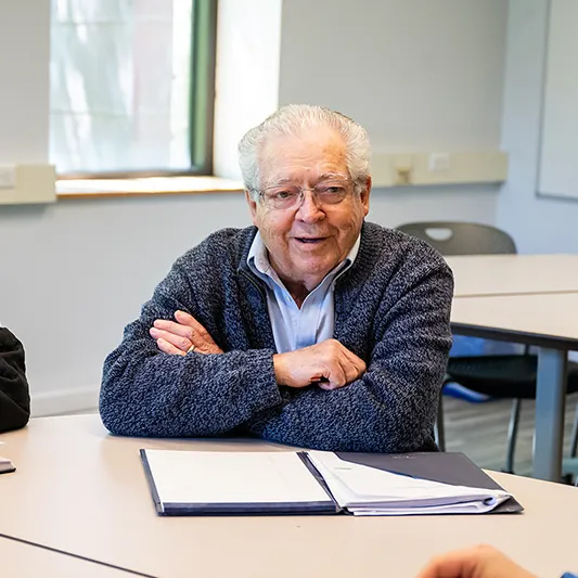 Edenwald_Programs-Events_life-long-learning An elderly man in a classroom during a lesson